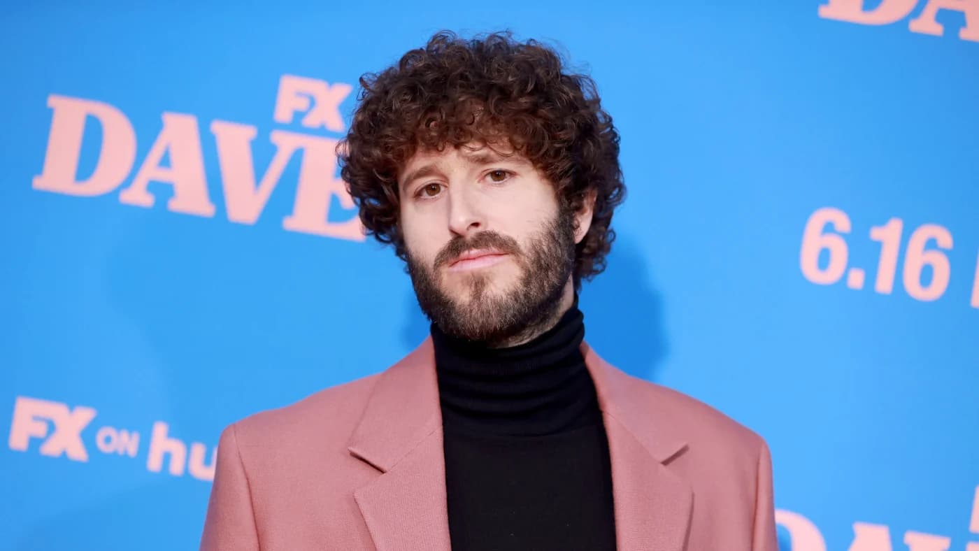 Lil Dicky explains how Usher inspired him to strip onstage